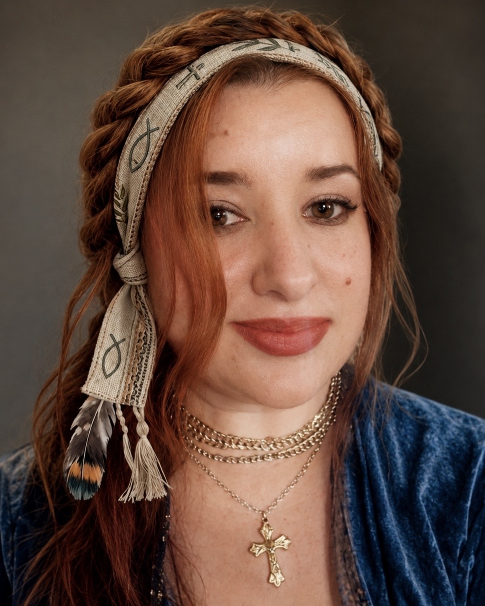 Wendy G. Billboat, founder of Holy Acres Retreat, wearing a headband stitched with crosses and a cross necklace